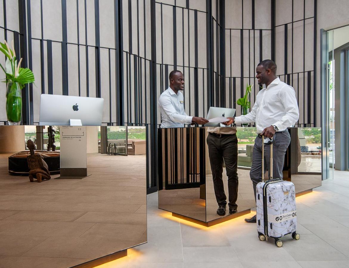 Noom Hotel Abidjan Plateau Exterior foto The hotel's lobby